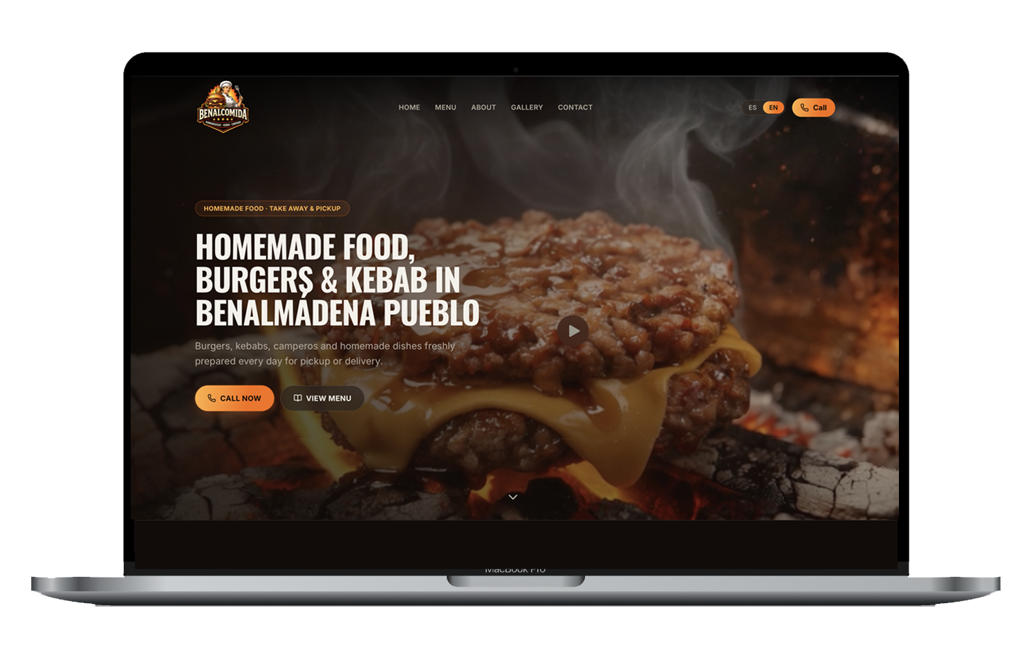Benalcomida homepage shown on a MacBook